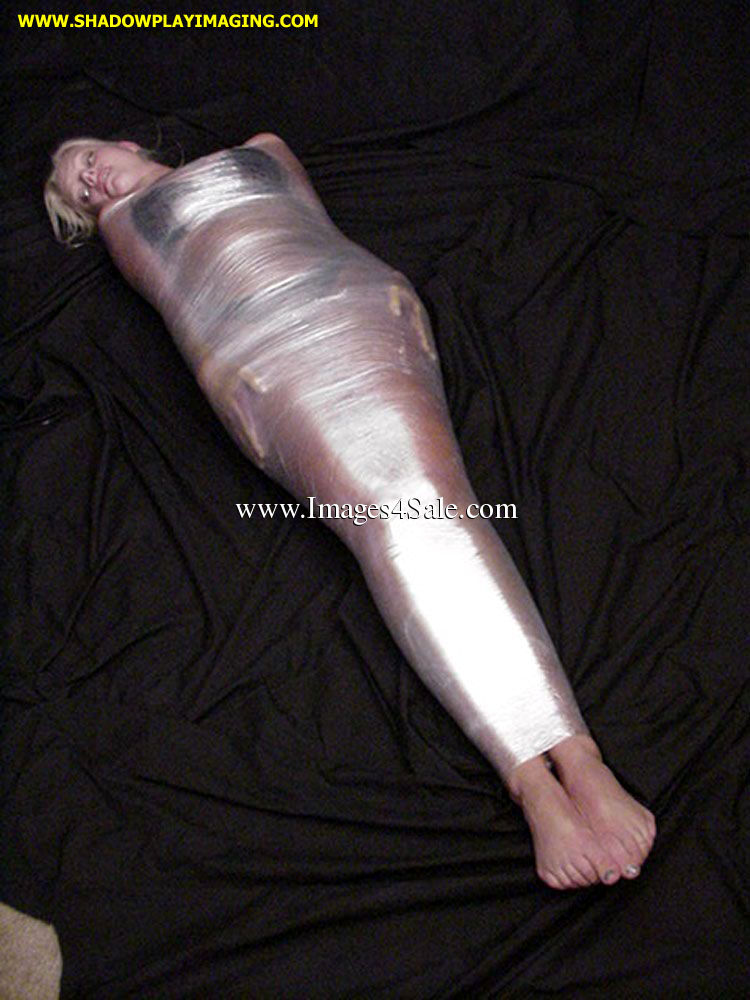 Mad M. reccomend girl getting wrapped saran wrap show