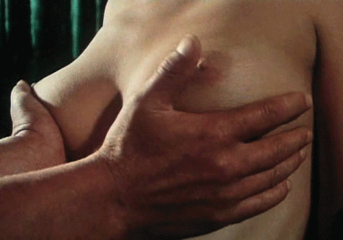 Caressing beautiful breasts
